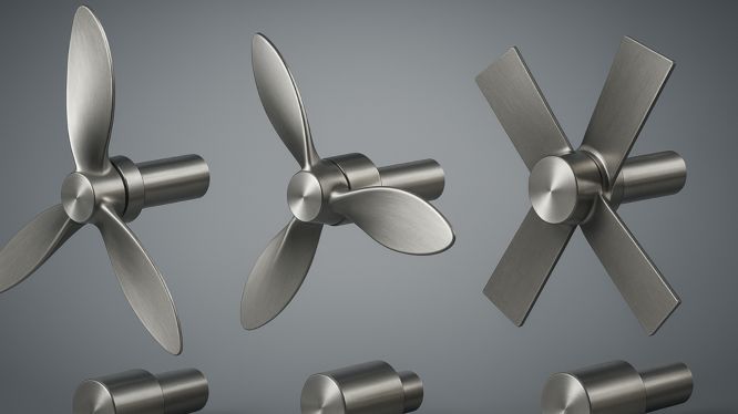 Conjunto de distintos tipos de hélices metálicas para agitadores industriales, incluyendo modelos de 2, 3 y 4 palas, exhibidos sobre fondo gris neutro.
